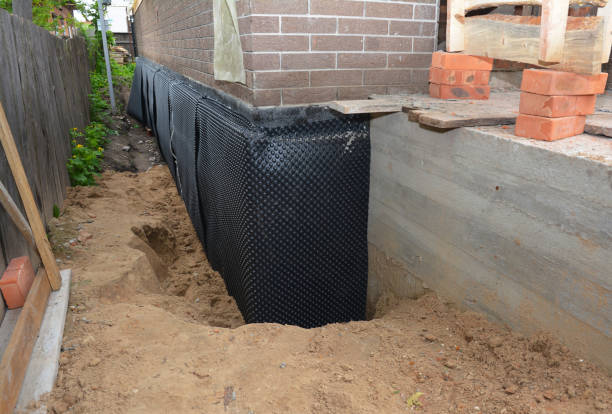 SJ Waterproofing Pros technician performing targeted Foundation Crack Repair assessment in Austell, GA